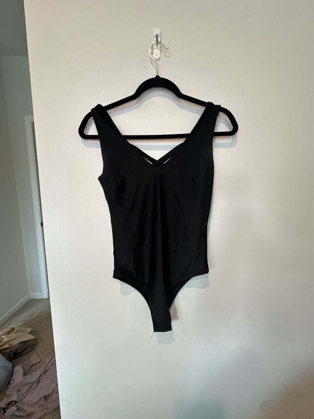 Gabrielle Union New York & Company Black V-Neck Criss-Cross Bodysuit